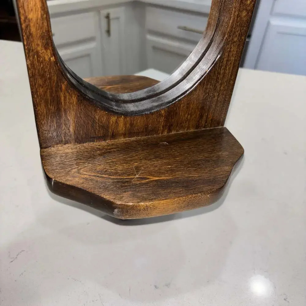 Vintage Wall-Mounted Dark Wood Sconce with Oval Mirror and Shelf